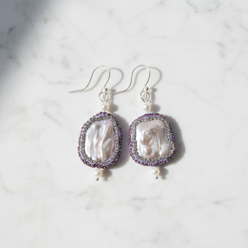 Flat lay of keshi pearl rhinestone earrings