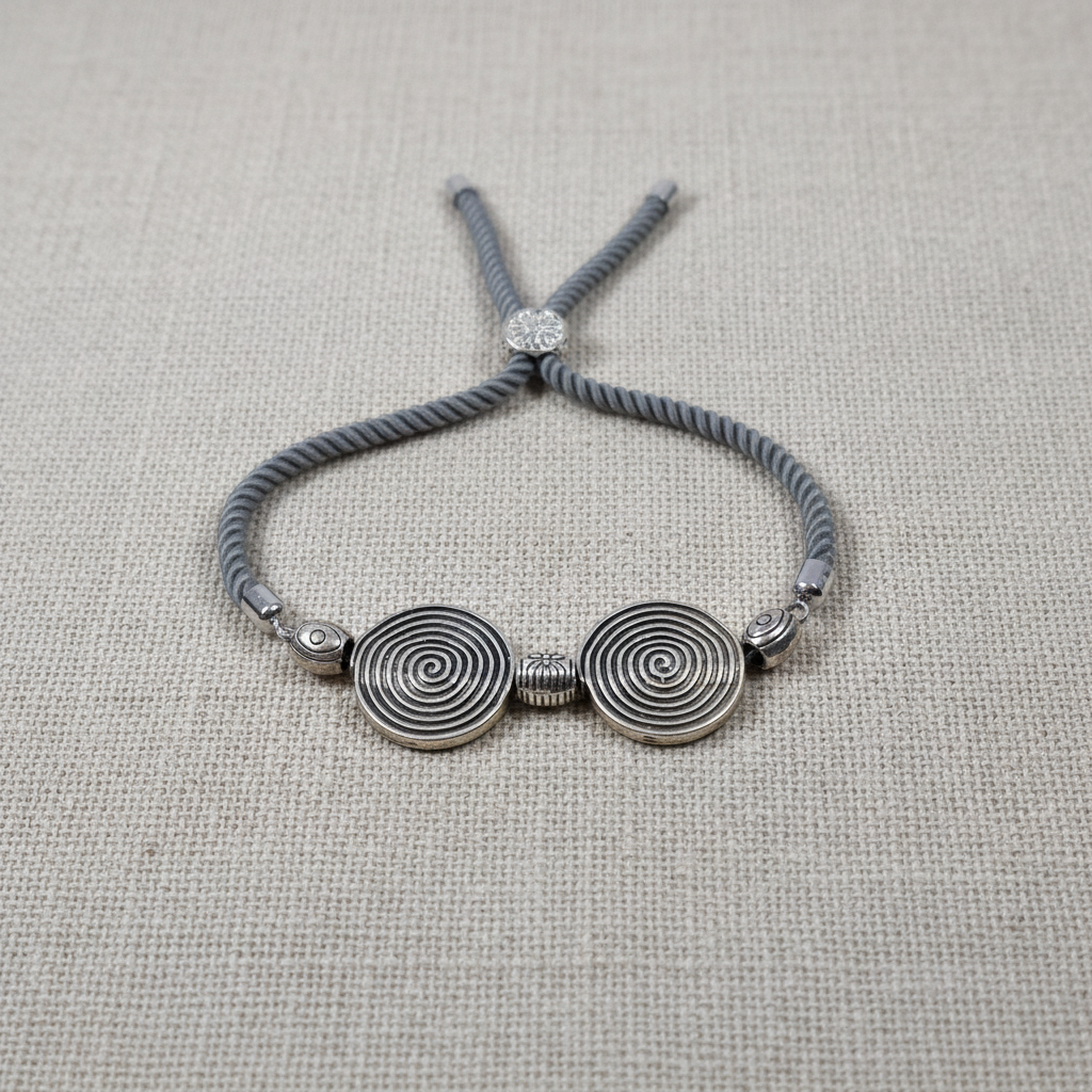 Spiral bracelet on linen